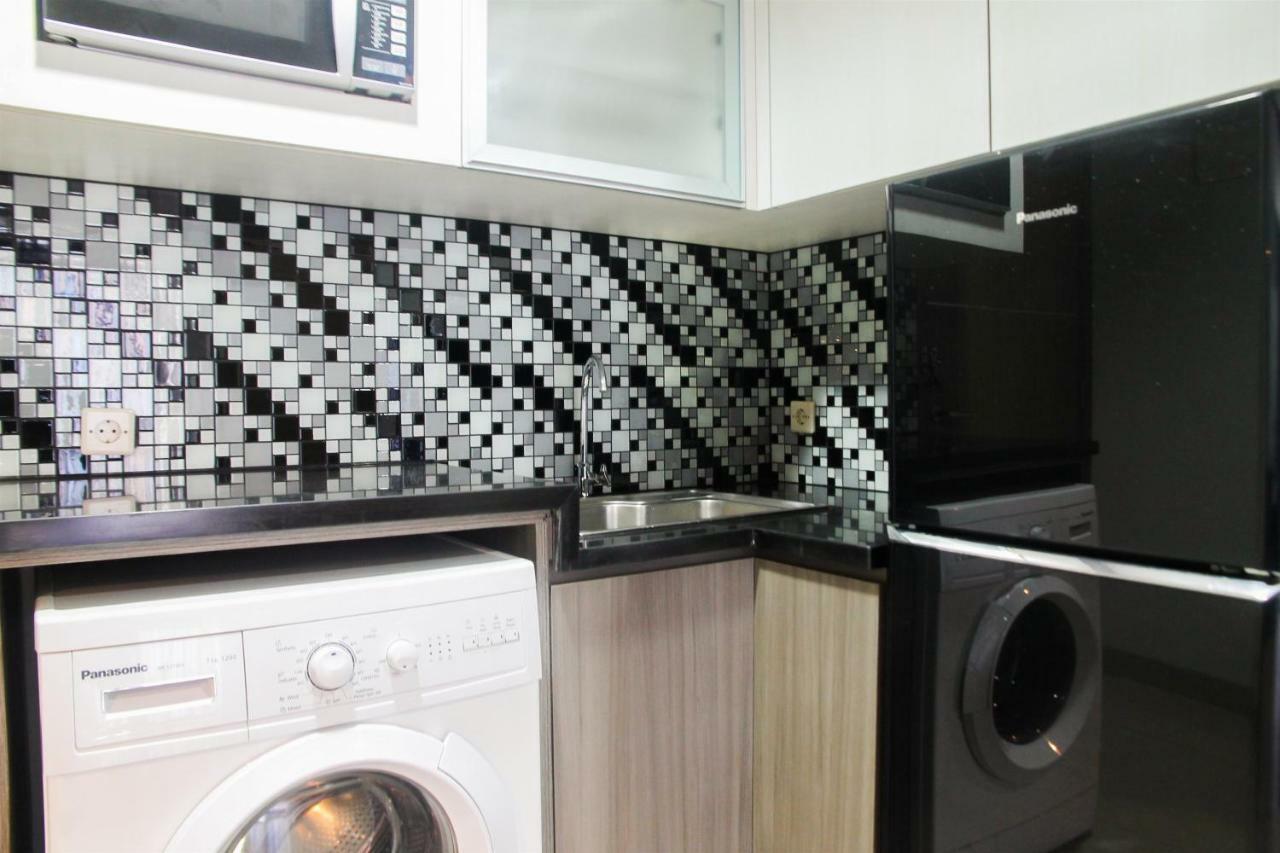 1br With Working Space The Oasis Cikarang By Travelio